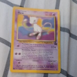 Pokemon Mew Card with Purple and Yellow